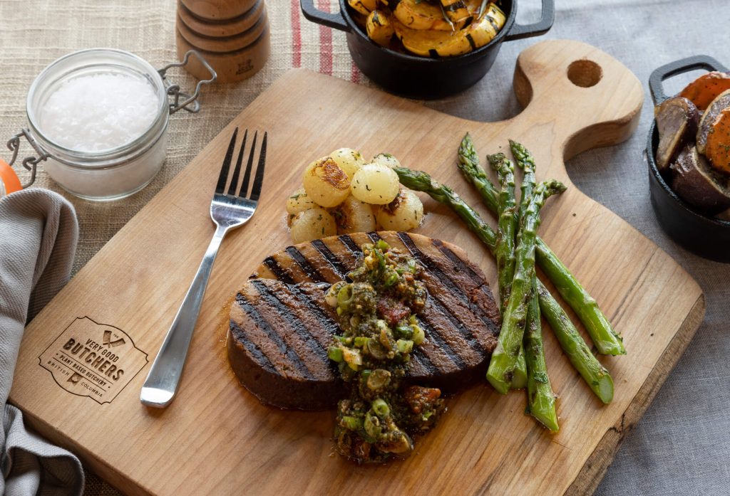 Steak meal on a wooden board commercial food product photography in Vancouver, Victoria, Vancouver Island, BC.