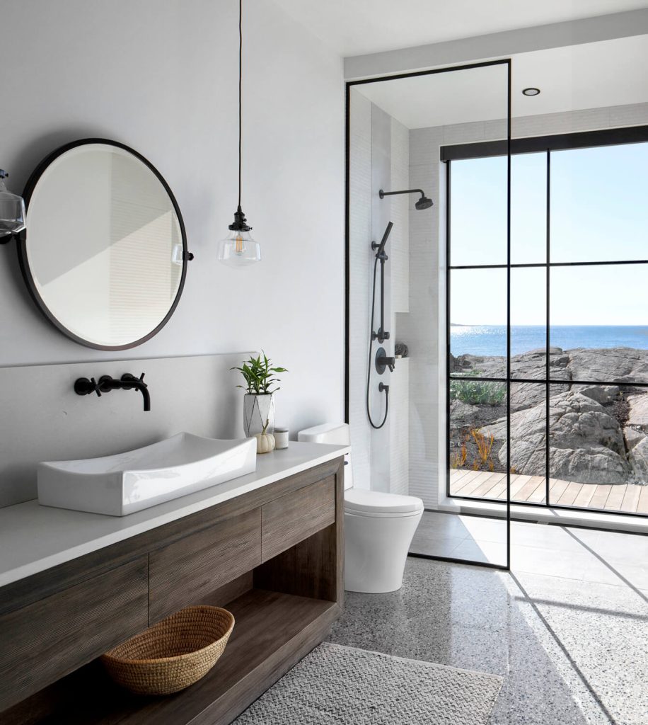 Modern bright bathroom interior design with coastal view photography in Victoria, Vancouver, Nanaimo