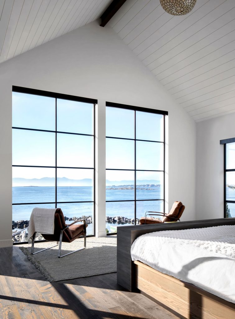 Bedroom with a coastal view, interior residential design photography on Vancouver Island.
